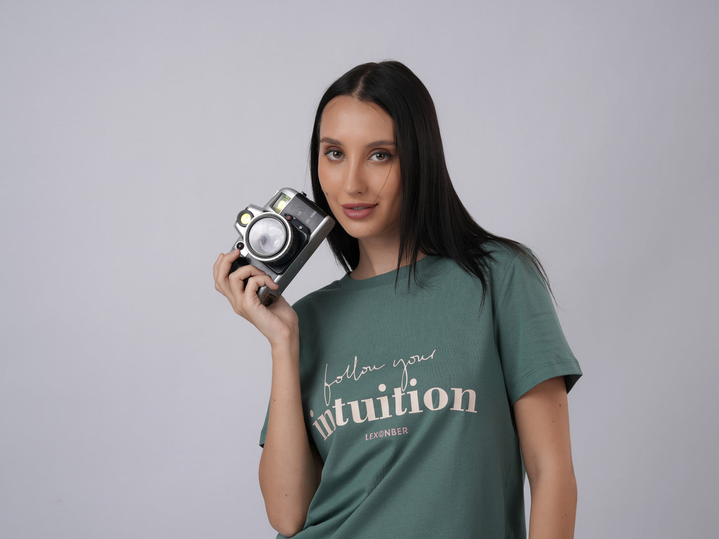 Close-up view of women's organic cotton 'Follow Your Intuition' printed eucalyptus green tshirt - Lexanber UK