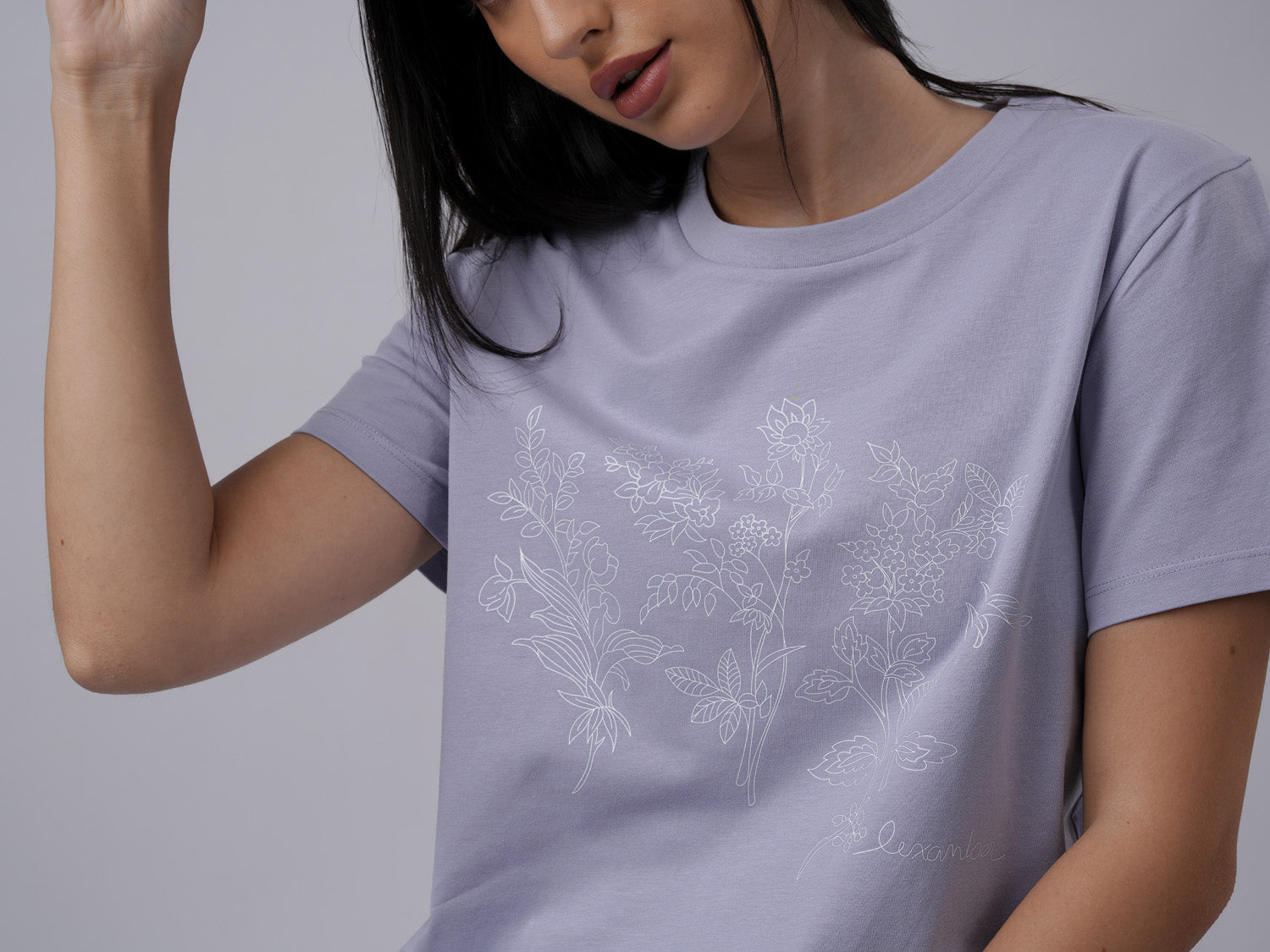 Close-up view of women's organic cotton floral print lavender tshirt - Lexanber UK