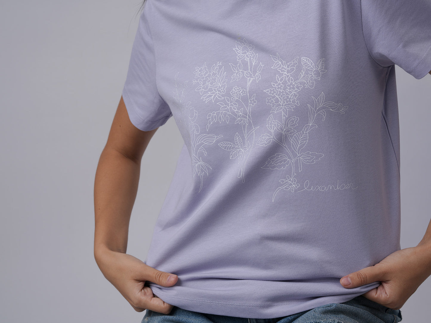 Close-up view of women's street wear organic cotton floral print lavender tshirt - Lexanber UK