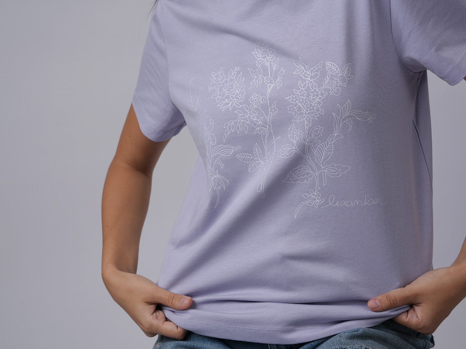 Close-up view of women's street wear organic cotton floral print lavender tshirt - Lexanber UK