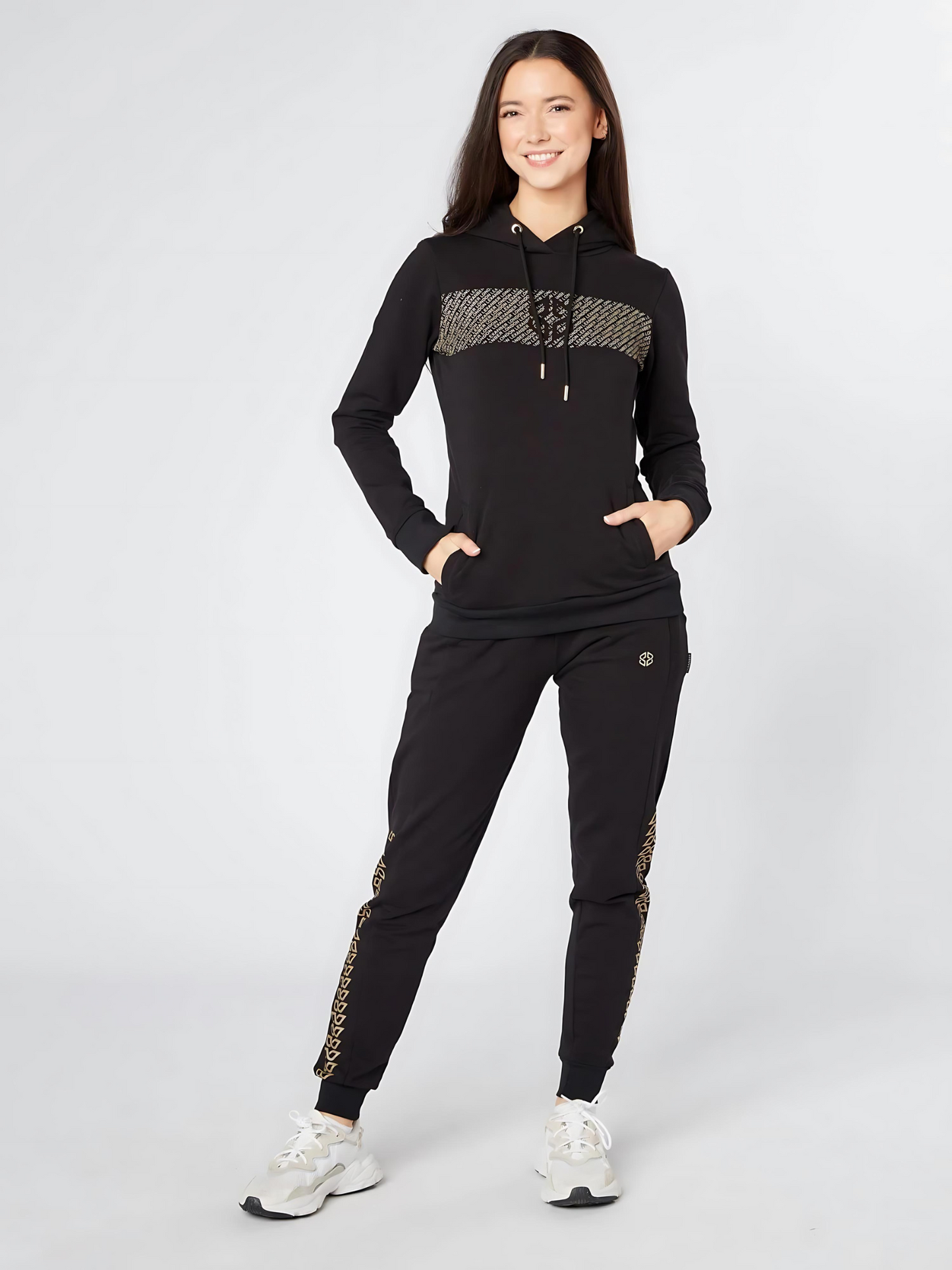 Model wearing LEXANBER women's slim fit hoodie and jogger with golden pattern - Lexanber UK