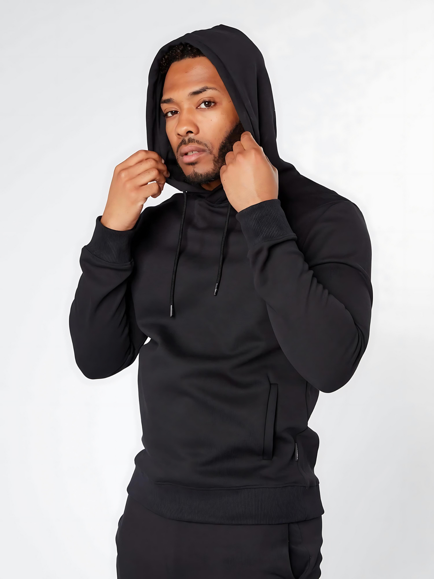 Men's slim fit casual wear overhead hoodie in black with hood on - front view - Lexanber UK