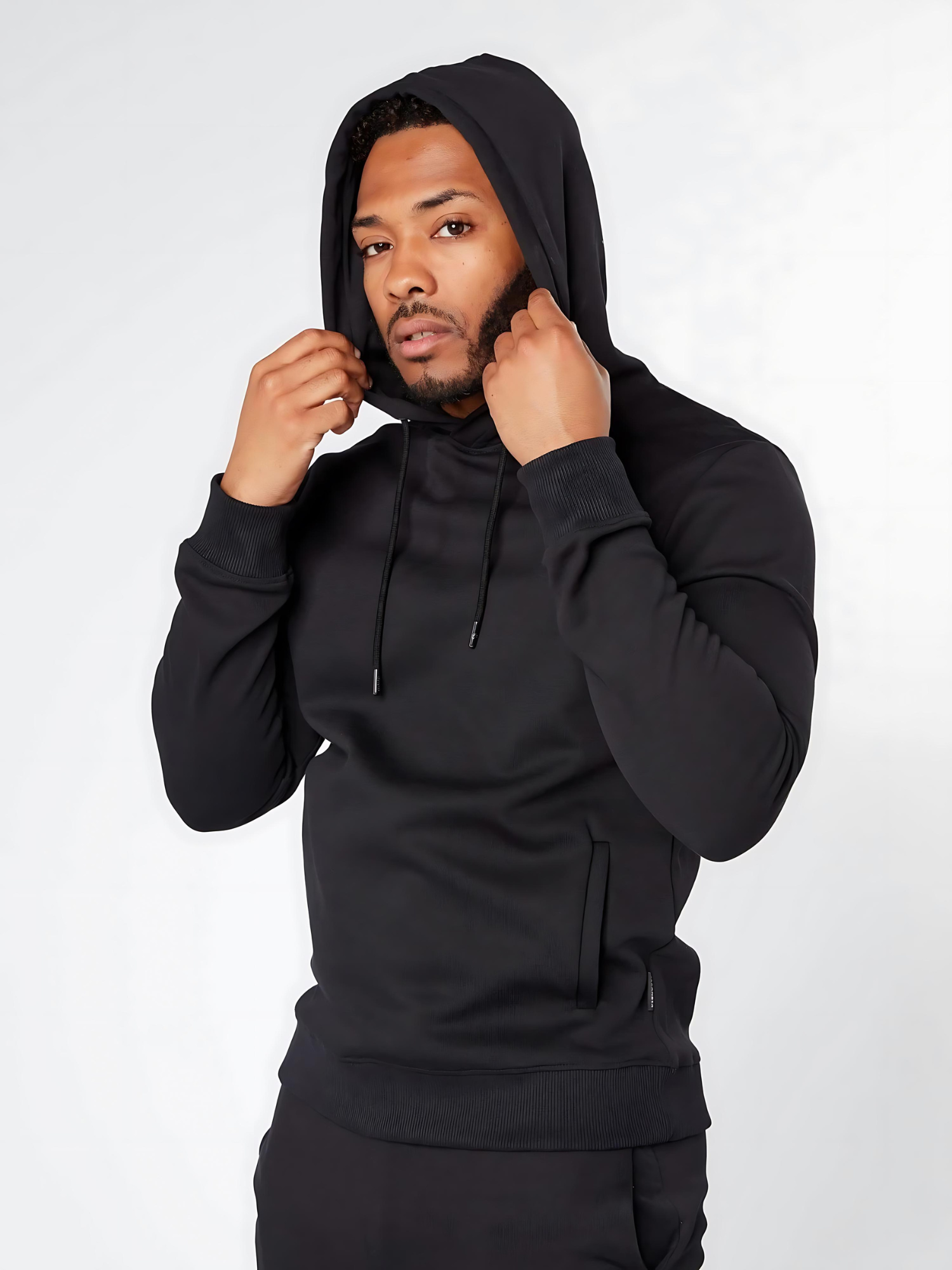 Men's slim fit casual wear overhead hoodie in black with hood on - front view - Lexanber UK