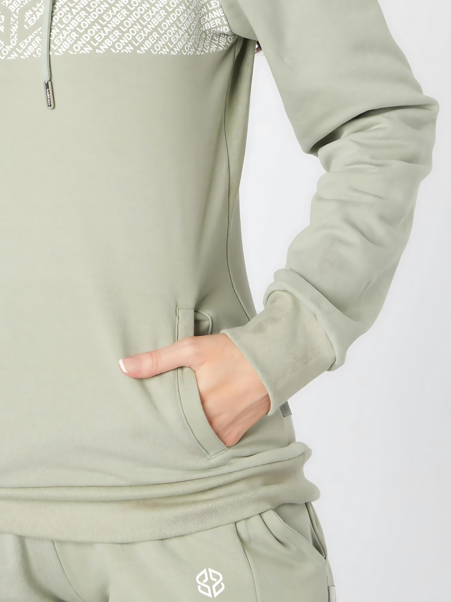 Close-up view of slim fit women's street wear sage green hoodie with graphic print - Lexanber UK