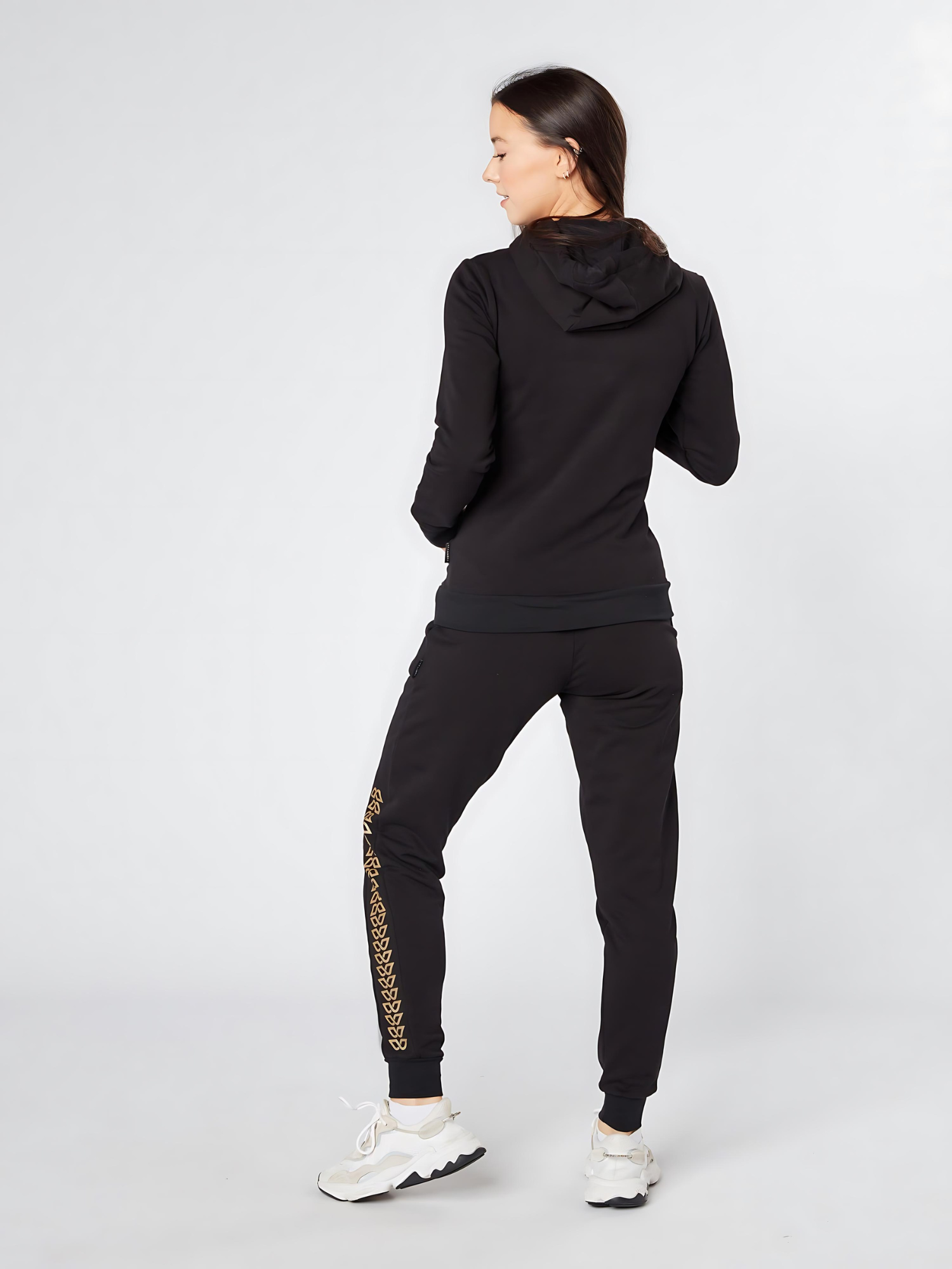 Slim fit women's street wear cotton rich stretchable jogger in black with golden geometric pattern - back view - Lexanber UK