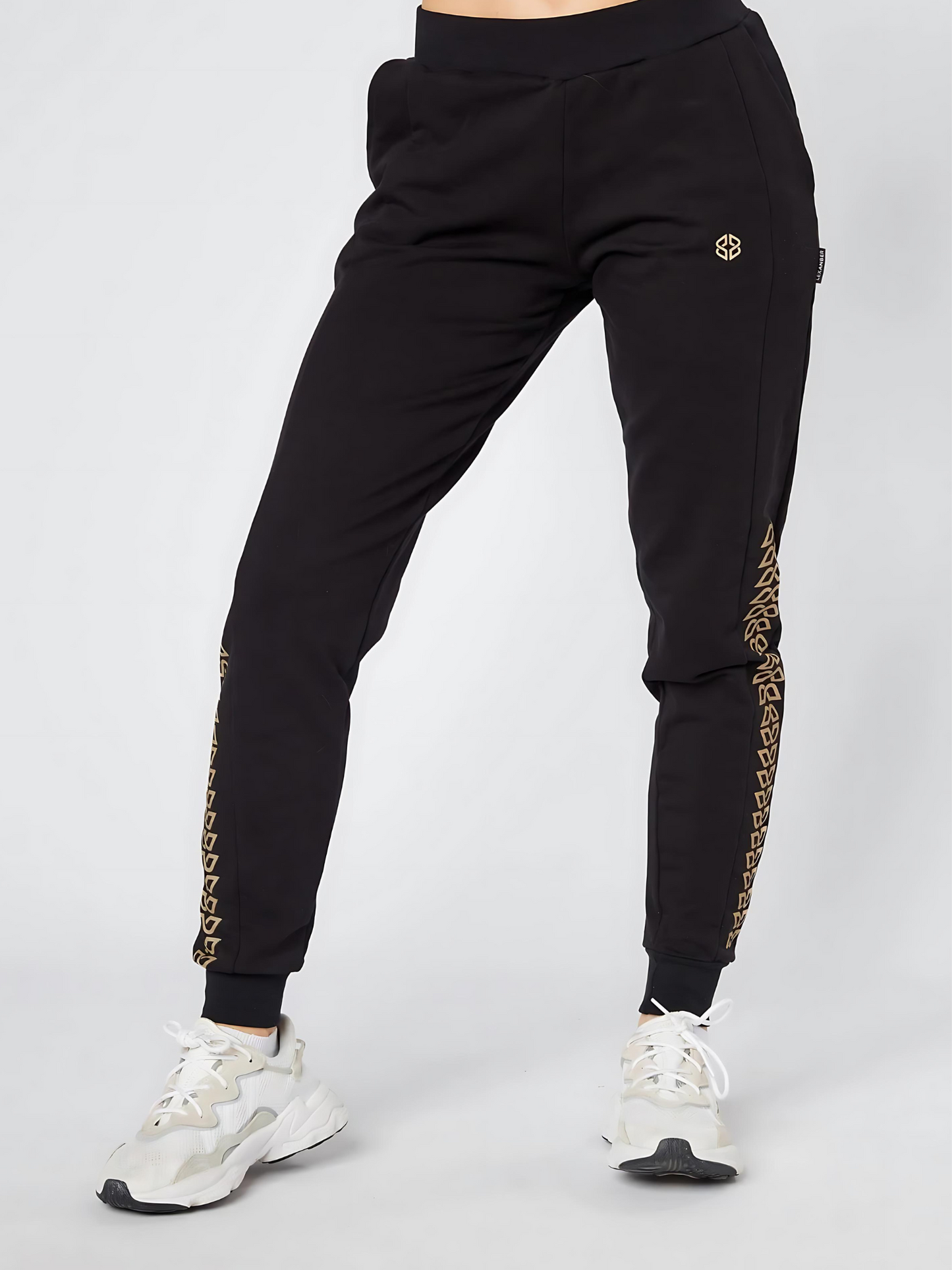 Slim fit women's daily wear cotton rich stretchable jogger in black with golden geometric pattern - front view - Lexanber UK