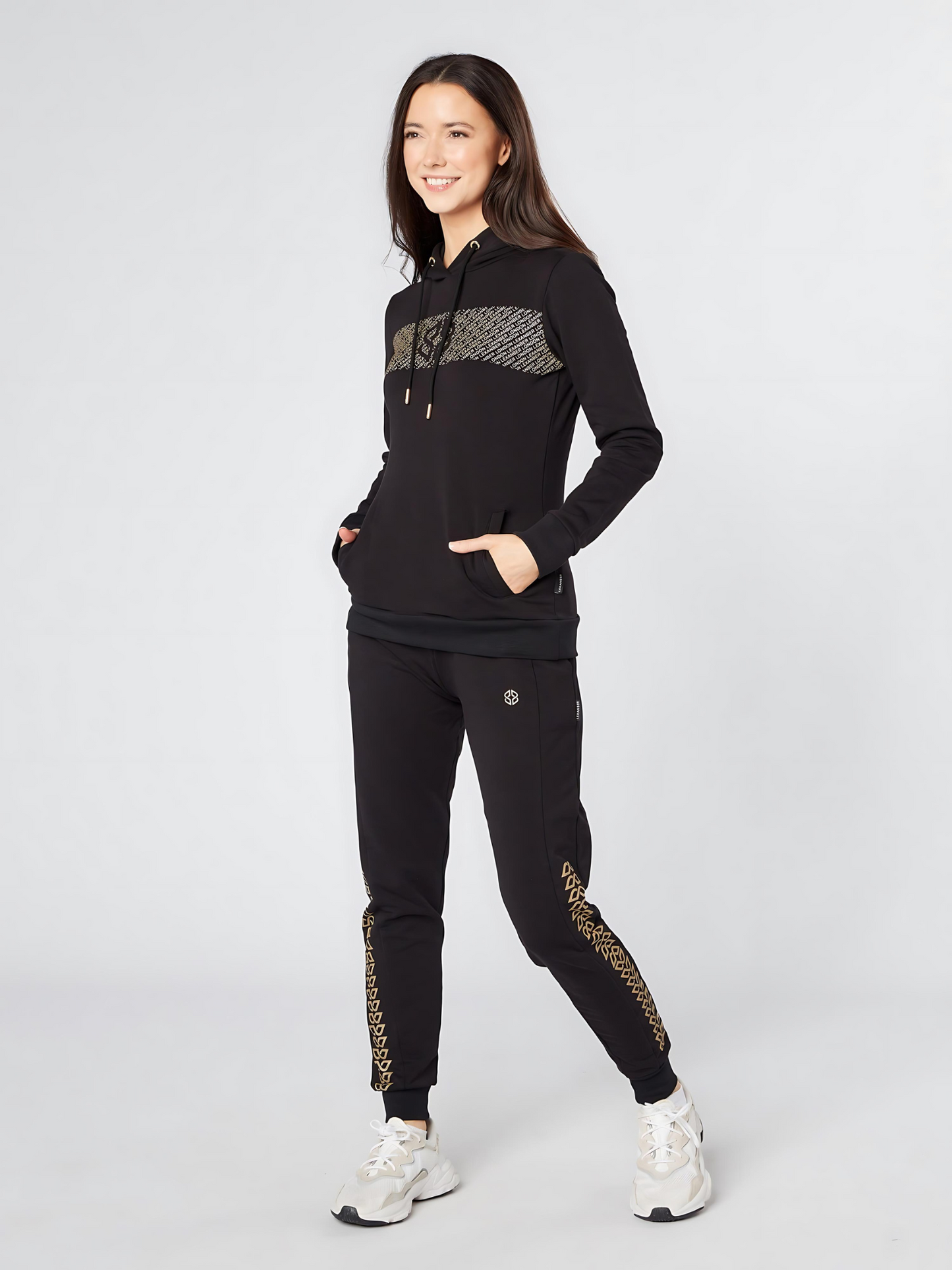 Model wearing slim fit soft fabric jogger and hoodie with golden print - Lexanber UK