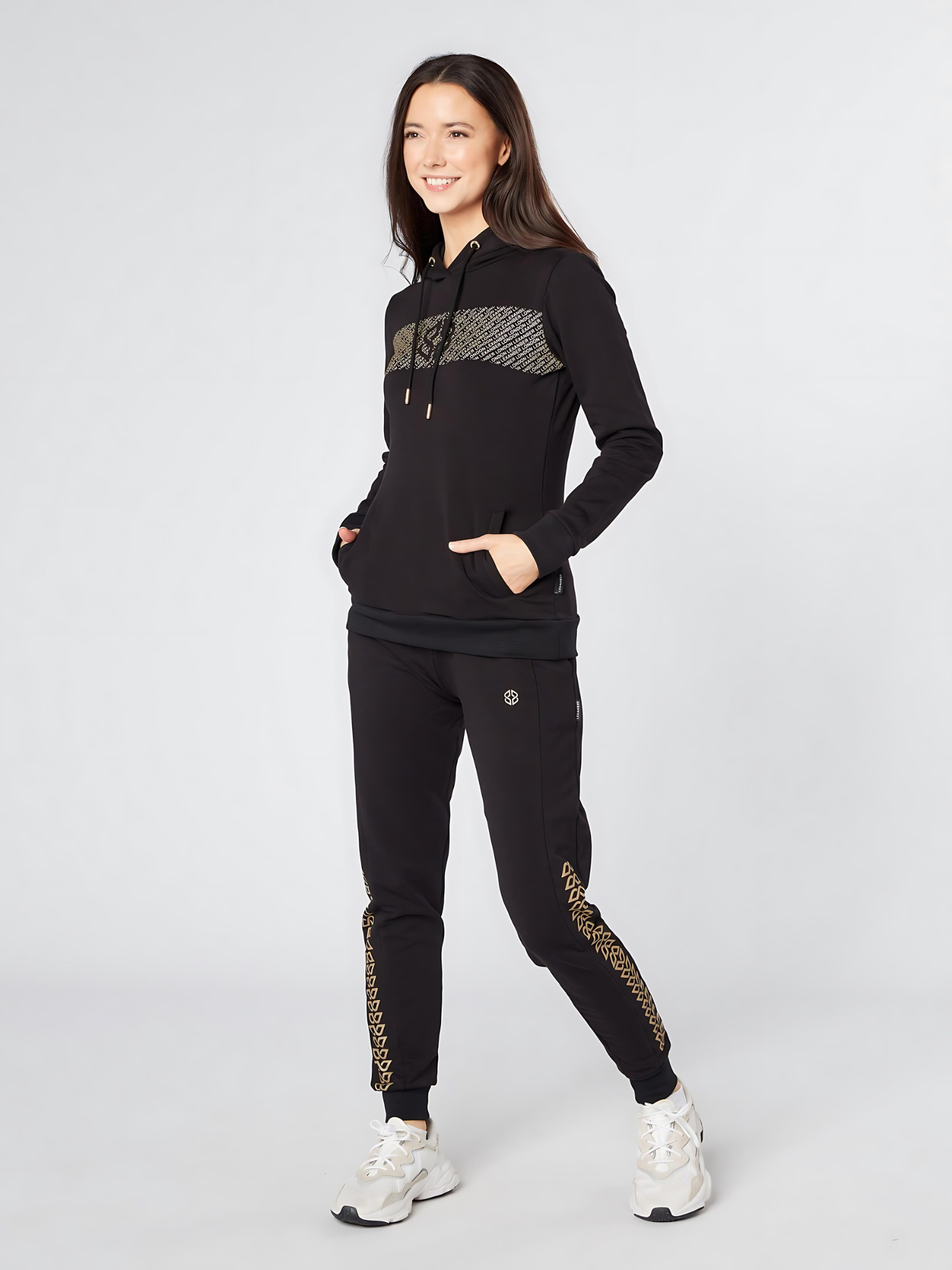 Model wearing slim fit soft fabric jogger and hoodie with golden print - Lexanber UK