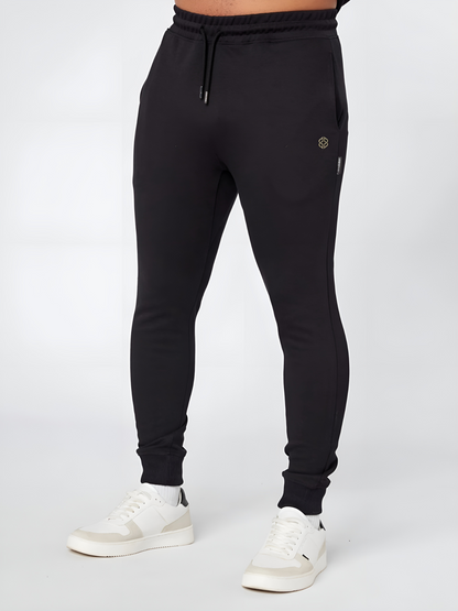 Mens slim fit casual wear black jogger with golden logo - front view - Lexanber UK